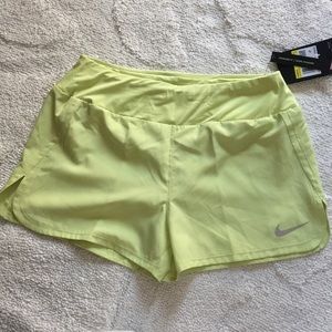 NWT pastel lime Nike running shorts!